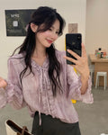Ruffled Tie-Neck Blouse