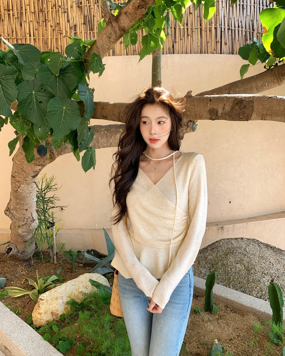 Wrap-Front Peplum Knit Top