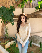 Wrap-Front Peplum Knit Top